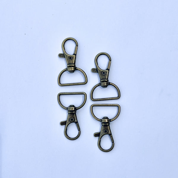 Four - 3/4" Swivel Hooks Antique Brass